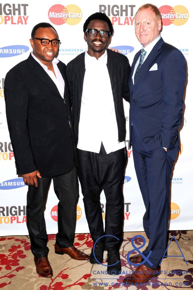 Glen Baxter looking sharp, dressed in head to toe Gotstyle, featuring a fine check navy suit by Ted Baker with DJ Tony Okungbowa and Cy Campbell.